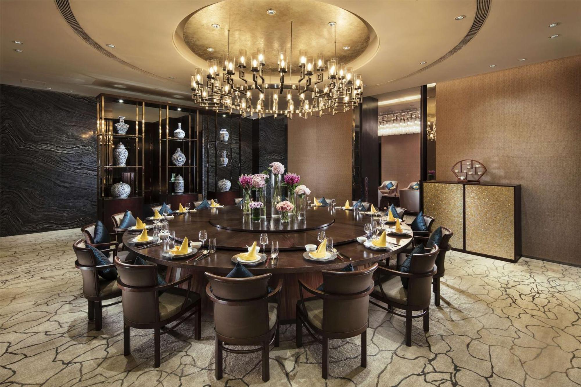 Hilton Guangzhou Tianhe - Free Shuttle Bus And Registration Counter Available During Canton Fair Period Exterior foto A private dining room at the restaurant