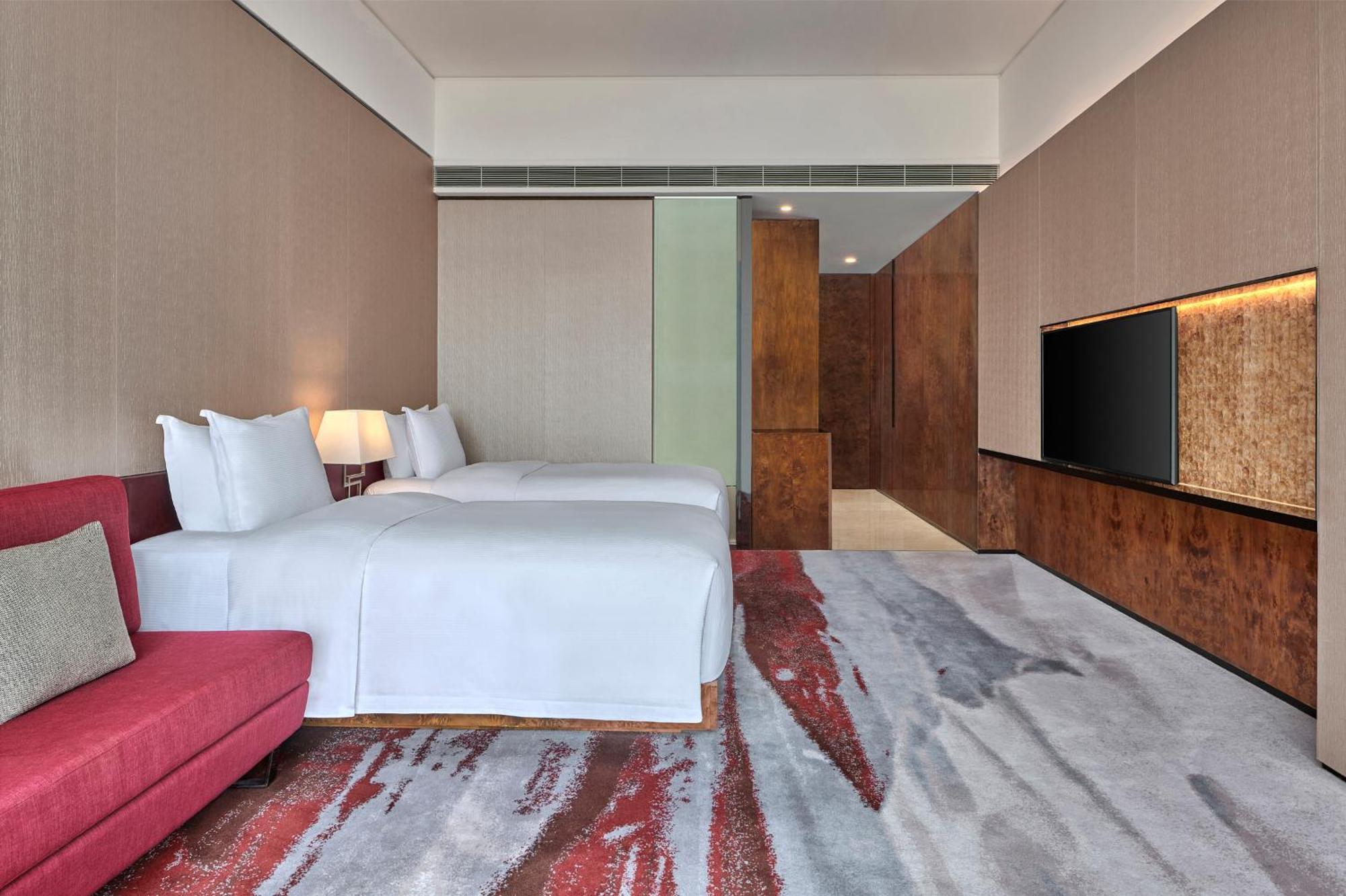 Hilton Guangzhou Tianhe - Free Shuttle Bus And Registration Counter Available During Canton Fair Period Exterior foto Deluxe Room